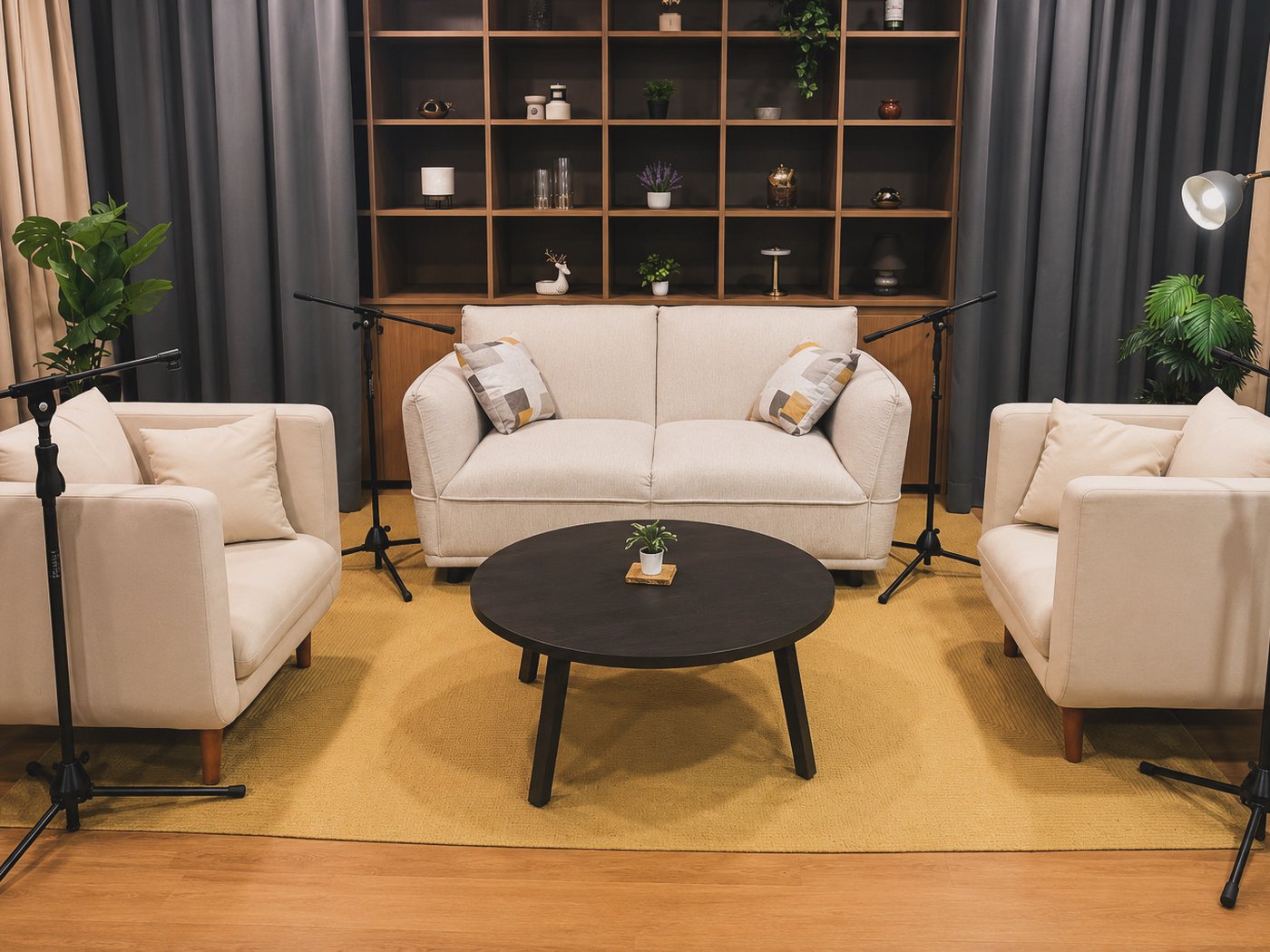 Podcast zone at Studio RYST — sofa seating and broadcast-ready setup